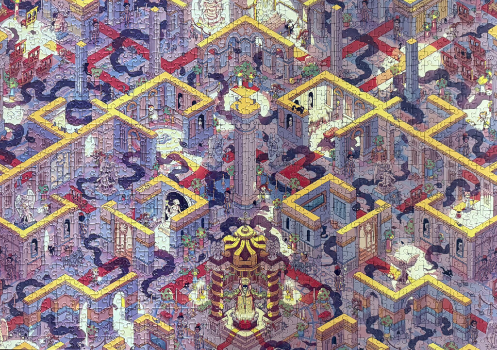 The completed jigsaw puzzle is lying on a table.