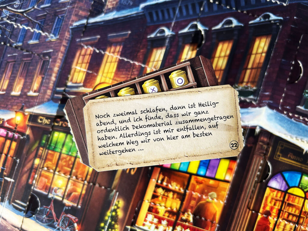 Zwei Rätselkarten des Adventskalenders „Der kleine Teeladen“ von Ravensburger.